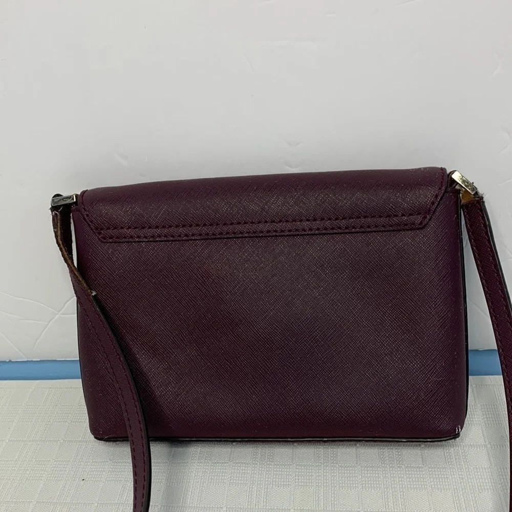 KATE SPADE Newbury Lane Sally Crossbody leather bag mulled wine